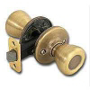 Security Tylo Tylo Antique Brass Passage Lockset 200T5RCLRCSBX by Kwikset