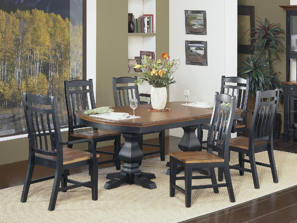 Riverside double pedestal table with 4 slat side chairs and 2 slat arm chairs.
