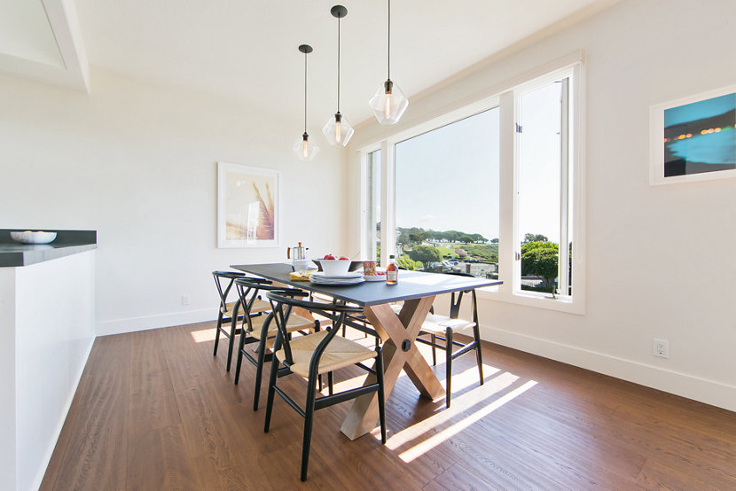 Trove Pendants in Crystal Glass Illuminate This Laguna Beach Dining Room