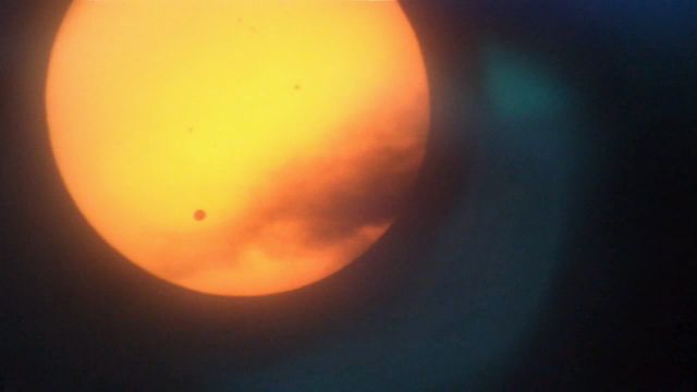 Venus Transit and Cloud Wisp