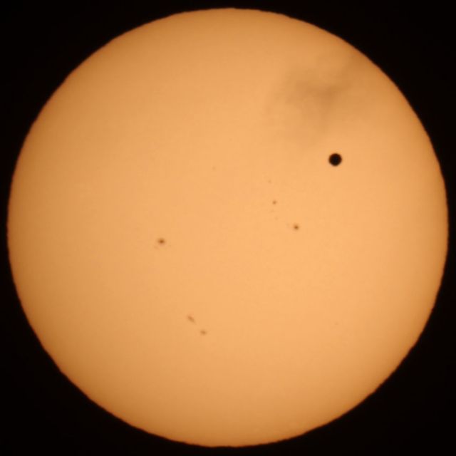 Transit of Venus with Cloud Whisp