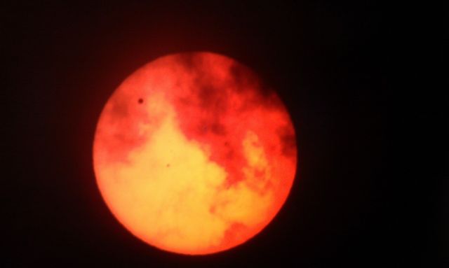 Venus Transit with Clouds