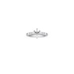 Pear Shaped and Round Diamond Engagement Ring