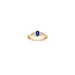 Oval Sapphire and Round Diamond Three-Stone Ring