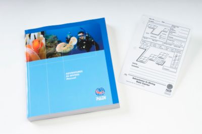 Adventures in Diving manual with slate