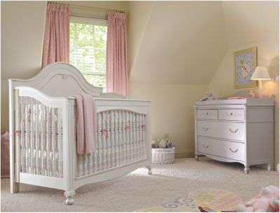 mismatched crib and dresser