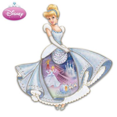 Doesn't your heart ache for the lovely Cinderella, when the clock strikes midnight and she must leave her handsome prince (and one telltale glass slipper) at the ball? Now, your very own pumpkin carriage and prancing steeds will whisk you away in enchanting Disney Cinderella wall decor crafted in fine porcelain and embellished with shimmering simulated gems and glitter. Relive memories of a fairytale where true love reigns with this limited-edition Disney princess collectible, available from The Bradford Exchange. The skirt on this enchanting Cinderella wall decor or ideal Disney gift showcases full-color artwork that tells the princess's amazing story. Touch-the-heart demand is expected, so hurry before the clock strikes. Order now!A fine collectible, not intended for children.