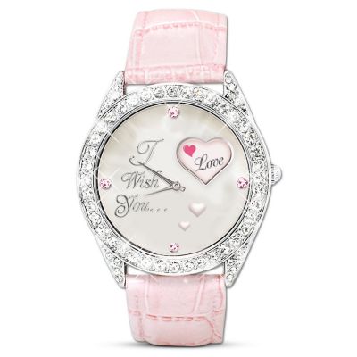 Give a beloved daughter a timely reminder of your love with a dazzling daughter watch lavished with a pave of glittering crystals! As the seconds tick by, she'll delight to the heart-shaped rotating watch display that sends her wishes for love, joy, hope, peace and health!Celebrate a loving daughter every minute of the day with this lovely crystal watch, only from The Bradford Exchange. This handcrafted daughter watch with precision quartz movement features 4 twinkling pink crystals on the watch face. The back of the watch is beautifully etched with the sentiment "My Daughter, I Wish You." Pink, stitched-leather strap adjusts to fit most wrists. Heavy demand is expected for this glittering expression of love that makes a fabulous daughter jewelry gift. Don't miss out - order now!California Residents click here for Proposition 65 notice.