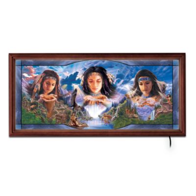 In the valley between the mountains flows a great river of life where all the animals of the wild come together to nourish body and spirit. Soon, three beautiful maidens appear - the sister spirits of Earth, Water and Wind - to bestow gifts of beauty and life to the nature around them. Now you can enjoy this beautiful scene every day with a stunning Native American-style stained-glass art panorama by artist Robin Koni, but only if you hurry. Only 1,500 of this collectible wall decor will ever be made!Available exclusively from The Bradford Exchange, this limited-edition collectible wall decor is a unique canvas for artist Robin Koni's work. Admire the breathtaking panorama filled with animals of all kinds, an abundant landscape and the three raven-haired spirits in the sky - all realized in vibrant color on stained glass. Best of all, at the flip of a switch, your Native American-style stained-glass art panorama lights from within to accentuate the rays of sunlight streaking across the swirling sky. Hurry to bring home this collectible wall decor and be inspired by its majestic beauty every day. The edition is limited to only 1,500, so order now!