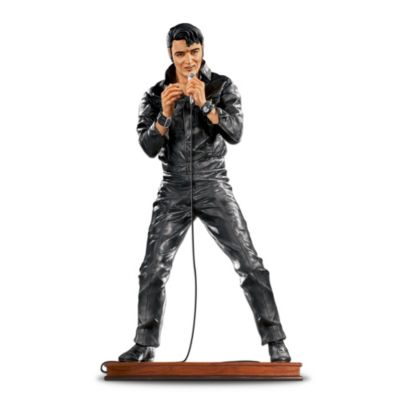 Over 50 years ago, a musical thunder roared out of the South. He would come to be called The King of Rock and Roll&reg;. Now, a breathtaking piece of Elvis Presley&reg; memorabilia commemorates his rich legacy. A towering Elvis tribute sculpture, this exclusive, limited-edition piece captures Elvis during his defining '68 Comeback performance and is the largest Elvis sculpture ever issued by The Bradford Exchange.Entirely hand-cast and hand-painted to capture every realistic, three-dimensional detail, this 30th anniversary Elvis collectible is licensed and authorized by the Presley Estate. And Elvis comes ready to rock, poised with a microphone, on a base plate featuring his replica autograph in gold script. This is the perfect piece of Elvis memorabilia to enhance your collection, or give as a collectible Elvis gift. This extremely limited edition will create intense demand so don't miss out. Order now!