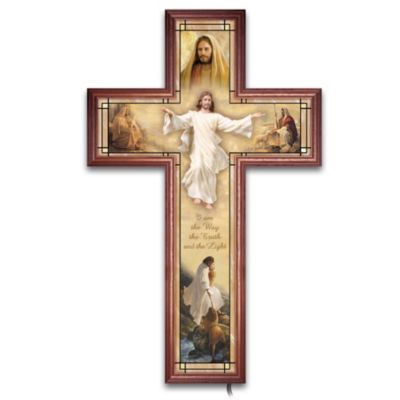 Believers everywhere are comforted by Jesus' wondrous story of love and sacrifice. Now, showcasing five visions of Christ by famed Christian artist Greg Olsen are united in a cross-shaped inspirational stained-glass wall decor masterpiece. When the system of miniature LED lights built into the frame is turned on, you will experience the radiance glowing through the colorful glass in a dramatic new way.Enjoy a magnificent union of art, glass and light with this poignant limited-edition stained-glass wall decor, available only from The Bradford Exchange. This single glass edition is hand-fired so Mr. Olsen's powerful imagery and vivid colors become one with the jewel-toned glass. Bears the tender words "I am the Way the Truth and the Light." Impressively sized, this stunning masterpiece will bring beauty and hope into your home. Strong demand is expected, and you won't want to miss out. Order now!