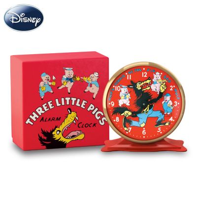 From the dark days of the Great Depression emerged an animated short so well-made that it is still widely regarded as one of the most influential Disney shorts - The Three Little Pigs. Claim a piece of Disney history with the classic replica Three Little Pigs Clock, identical in size, shape and color scheme to the extremely rare original produced in 1934.Licensed by Disney and available from The Bradford Exchange, the clock face features the Three Little Pigs merrily posed under their anthem's title, "Who's Afraid of the Big Bad Wolf?". Their notorious adversary, the Big Bad Wolf, keeps accurate time with his arms, recalling his frantic pursuit with precise movement. Every authentic detail will delight, including the packaging which recreates the original illustrated box with Fifer Pig, Fiddler Pig, Practical Pig and the Big Bad Wolf in full color. High demand is expected for this 1934 Three Little Pigs clock replica, so don't wait. Order now! A fine collectible, not intended for children.