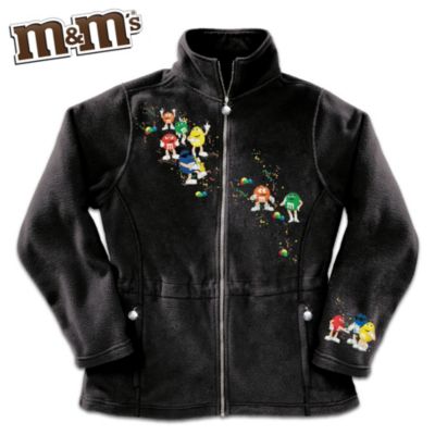 Take the colorful fun of the whimsical M&M'S&reg; characters with you wherever you go when you enjoy the comfortable styling of this M&M'S fleece jacket, a design exclusive from The Bradford Exchange. Introducing one-of-a-kind M&M'S character apparel featuring embroidered artwork of your favorite candies across the front, back and sleeve, in a grand celebration of sweetness. This cozy M&M'S fleece jacket for women is expertly fashioned of high-quality mid-weight fleece for incredible comfort and wind resistance. Featuring a flattering princess cut, this wardrobe essential showcases an artful representation of the iconic M&M'S logo and characters. For a special treat, the front, and the two side zippers of this women's outerwear are graced with metallic M&M'S zipper charms. Sporting a drawstring waist and collar that can be worn up or down, you don't want to miss this sweet and wearable work of art. Order now!