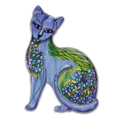 With their expressive faces and curious personalities, cats bring such joy to our lives. Celebrate the intriguing feline with this cat-themed wall decor that recreates the color, detail and imagery of stained-glass art by Louis Comfort Tiffany in lustrous Heirloom Porcelain&reg;. As precious as a jewel and exclusively from The Bradford Exchange, this limited-edition collectible cat-themed wall decor is a breathtaking presentation of feline elegance! The cat silhouette's bas-relief styling features floral art and is brilliantly colored in shades of vibrant violet, rich sapphire blue and vivid emerald. Black outlining and gleaming platinum highlights lend added elegance. Heavy demand is expected, and you won't want to miss out. Order now!