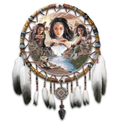 She is a spiritual maiden whose soul holds the earth's promise, the sun's warmth and the splendor of life-sustaining waters. Now, a first-of-its-kind Bradford Exchange exclusive Native American-inspired replica dreamcatcher celebrates this sacred spirit of nature. Acclaimed artist Robin Koni's original composition is dramatically presented on genuine tanned leather stretched and hand-tied to the sculptural frame with real leather lacing. Collectible replica dreamcatcher is impressively sized at over two feet high! Capture the spirit of the sacred elements with this breathtaking replica dreamcatcher. Mr. Koni's artwork depicts a maiden with a lovely face, hair decorated with centuries-old symbols and wearing a fringed dress. Replica dreamcatcher's frame is expertly handcrafted of artist's resin and hand-painted for superb detail. Sculpted Native American-themed icons, wood beading and real feathers add authentic accents to the frame. Heavy demand is expected for this limited-edition wall decor art, and you won't want to miss out. Don't delay - order now!