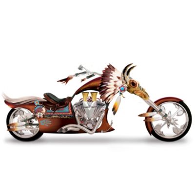 Grab hold, rev up and let your inner spirit fly down the highway like an arrow tearing the sky! When you ride the Sunset Rider, the open plains of North America are yours to command. This collectible Native American-themed motorcycle sculpture recalls the legend of a warrior who was guided by the freedom of the wind and the thrill of the chase, and is available only from The Bradford Exchange.Handcrafted in artist's resin and hand-painted in full-color, this masterpiece chopper sculpture gleams with diecast metal details and golden and silvery tones. From the symbolic buffalo art and traditional hand print designs across the side to the powerfully dramatic sculpted feather headdress, this unique biker gift demands attention at a full 18 inches in length. Don't miss this limited-edition customized tribute to the power of freedom and the spirit of exploration. Order now!