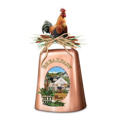 The clanging of a cowbell is a welcoming sound on a farm. It gathers people around a table for good food and fellowship. You can add warm country decor to your home with this first-of-its-kind collectible country cowbell featuring the art of Charles Wysocki, one of America's most popular artists. This charming and fully-functional copper breakfast bell (It really clangs!) features Mr. Wysocki's famed American art of country life long ago, with people milling about by an antiques barn and horse drawn carriages. This Bradford Exchange exclusive metal collectible cowbell has a rich, lustrous copper finish. Cowbell handle is topped by a sculptural handcast rooster finial, hand-painted for realistic color and detail, strutting atop a stack of cat tails. Heavy demand is expected for this limited edition, order now!