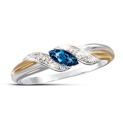 The sapphire has been treasured since ancient times by kings and others of esteemed high rank for its beauty and symbolism. It was known as the "Stone of Destiny", worn throughout history to signify truth and faithfulness. Now choose a ring with sapphire that dazzles - a stunning, marquise-cut sapphire to capture the rich blue radiance of this revered gemstone, "embraced" with genuine diamonds in a romantic ring for her, a fine jewelry exclusive from The Bradford Exchange!Individually handcrafted in solid sterling silver, this ring with sapphire and diamonds features 2 shining bands, one in shimmering silver and the other gleaming with 24K-gold plating. Twin pave diamond ribbons embrace the double two tone band, each glittering with 2 genuine diamonds. And at the center of this contemporary "twist" on the eternity design is a magnificent, marquise-cut sapphire. This romantic ring for her brings together beauty and radiance in an "embrace" for all time. Demand is likely to be high, so be sure to order now!