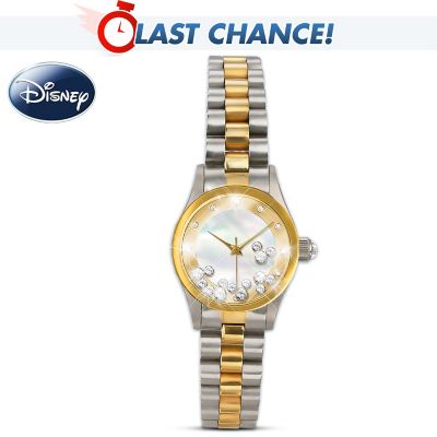 After over 80 years of magic, Mickey Mouse and Disney continue to inspire the world around us! Now you can share in the enchantment with the Timeless Magic women's Mickey Mouse watch, a design debut from The Bradford Exchange. Five glittering Mickey Mouse silhouettes crafted of Swarovski&reg; crystals move freely inside the watch face for a floating effect that dazzles the eye!Finely handcrafted of stainless steel with a precision quartz movement, this Mickey Mouse watch with floating Swarovski crystals features a genuine mother of pearl watch face and Swarovski crystal accents indicating the hours. As a final touch, Mickey's silhouette and a message which reads, "Timeless Magic" is etched on the reverse side of the watch case. High demand is expected, so don't delay. Order now! California Residents click here for Proposition 65 notice. This fine watch is intended for adults.
