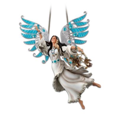 Close your eyes and feel the power. Let this elegant first-ever Native American-style spirit maiden hanging sculpture inspire sweet dreams in you! The maiden wears a flowing dress, her arms outstretched. She has translucent, turquoise-colored wings that carry a spirit of tranquility and a special blessing for calmness and serenity. Her wings are outlined in antiqued metal and feature colored glass gems for extra style and sparkle.This artful sculpture is expertly handcrafted and hand-painted under the hallmark of Ten Eagles Studio, and exclusively from The Bradford Exchange. She carries a beautifully woven replica dreamcatcher that is embellished with sculpted beads, cording and real feathers. This inspirational maiden suspends from an adjustable hanging chain, allowing her wings to move and swing with ease. Edition is limited and strong demand is expected, so order now!