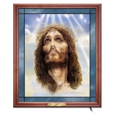 When biblical artist Mark Cannon drew this moving Jesus Christ portrait, faithful followers around the world took notice, for it seemed that the artist himself had been inspired by The Lord's presence. Available exclusively from The Bradford Exchange, this fully-illuminated stained-glass wall decor shines new light on the blessings of faith.Impressively sized at 20" high, this stained glass Jesus wall decor is hard-fired to faithfully recreate the deep shadows and individual pencil strokes of Cannon's masterpiece. Framed by graceful lines that emulate old world glaziers' lead, this gleaming single-glass edition lights up from within with a system of 16 built-in lights. High demand is expected, so don't delay. Order now!