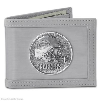 The Green Bay Packers have given their fans something to cheer about for nearly a century! Now, carry your team pride with you wherever you go with the first-ever stainless steel Green Bay Packers men's wallet, a singular achievement in craftsmanship and design exclusively from The Bradford Exchange.Officially licensed by NFL Properties LLC and handcrafted with 25,000 flexible stainless steel threads - three times thinner than a piece of paper - this Green Bay Packers wallet has the strength that surpasses leather with a feel as slick as steel. Convenient interior compartments include three credit card slots, two pockets, an ID window and large pocket for bills. Plus, this Packers wallet showcases a Packers helmet and team name on the front and is finished with a faux suede trim and lining. Carry it with pride or give as rugged Green Bay Packers fan gifts! Strong demand is expected, so don't miss out. Order now!