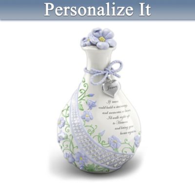 The tradition of collecting tears dates back to ancient times, when they were buried with loved ones as a symbol of honor. During the Victorian era, tear jars provided a constant reminder of the mourner's eternal love. Now you can express those same feelings with this heartfelt heirloom. The Forget Me Knot tear jar, available only from The Bradford Exchange, creates a touching personalized sympathy gift, lovingly nurtured by the tears of love. Personalize this fine Heirloom Porcelain?? bereavement gift with your loved one's engraved name for FREE, and it will grace an elegant, silvery heart-shaped charm.  Meticulously handcrafted by the skilled artisans from the porcelain house of Henri d'Arceau &amp; Fils of Limoges, France, this personalized tear jar is created from prized kaolin clay that is triple-fired and hand-glazed for exceptional luster and enduring beauty. Dozens of hand-set Swarovski?? crystals and glass jewels unite in a shimmering staircase design that winds around the jar, accenting the touching bereavement verse: a portion of the "If Tears Could Build a Stairway..." poem. Floral filigree and elegant forget-me-not blossoms are sculpted in low relief and hand-painted in soft pastel shades for a moving finishing touch. Let this limited-edition personalized sympathy gift ensure the memory of love forever. Don't miss your chance. Order now! California Residents click here for Proposition 65 notice.
