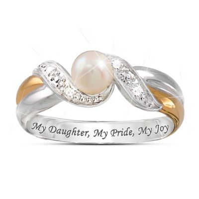 A daughter is a blessing beyond compare, a glowing ray of light that fills each day with joy and love. Now this stunning daughter ring lets her know just how much she means to you, expressing your deepest feelings in the shimmer of  diamonds and the glow of an exquisite cultured freshwater pearl.Boasting a unique fine jewelry design exclusively from The Bradford Exchange, this gorgeous cultured freshwater pearl and diamond ring is individually handcrafted in solid sterling silver and features two bands, one plated in rich 24K gold. A delicate pave ribbon sparkling with five genuine diamonds embraces the radiant cultured freshwater pearl. The final touch is a loving inscription inside the band: "My Daughter, My Pride, My Joy." The perfect dad-to-daughter or mother-to-daughter gift, this ring is sure to excite strong demand, so order now!