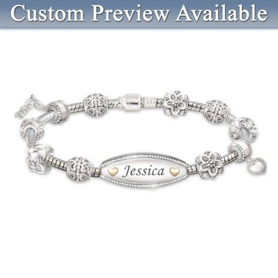 Your wonderful daughter brightens your life with so many moments of unmatched joy. Now you can show her just how you feel for her, in this My Daughter, My Love beaded bracelet that's a stylish and beautiful expression of your love. This fashionable charm bracelet for daughter is personalized just for her in a fine jewelry exclusive design from The Bradford Exchange. Provide her name to be custom engraved on the gracefully curved ID-style nameplate, and your personalized bracelet gift will surely become one of your daughter's most treasured personal jewelry items.This stylish ID-style charm bracelet features 11 handcrafted charms, gleaming with sterling silver plating and golden enamel accents. In the center is the personalized nameplate embellished with golden enamel hearts and your daughter's engraved name. Other charms include roundels with an intricate cut-out heart design, a hanging "Love" charm sparkling with a genuine Swarovski&reg; crystal, delicate flower charms, and a dangling heart charm. Best of all, this stunning bracelet for daughter arrives all put together and ready for her to wear. Because she will be delighted and deeply touched by this personalized gift of love, demand is likely to be high. Don't wait; order now!California Residents click here for Proposition 65 notice.