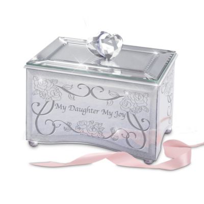Nothing compares to the special bond between you and your darling daughter. She brings joy to your days in ways you never imagined. Now, you can show your daughter how much she means to you with this limited-edition sparkling mirror music box, exclusively from The Bradford Exchange.Exquisitely handcrafted of mirrored beveled glass, this stunning music box gift for daughters features a loving message on its front framed by elegant etched accents. The lid opens with a silver-toned metal handle, intricately sculpted in a faceted twin heart design while the ornately-detailed legs glisten with silvery finishes. Plus, this loving keepsake plays "You Are So Beautiful" - the perfect melody to show daughter how much you care for her. For the perfect finishing touch, this treasure includes a heartfelt poem card with a touching message from you to her. Strong demand is expected. Order now!