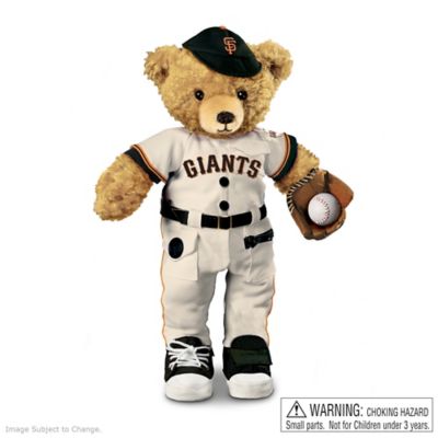 Coaching little kids is his game! This cuddly coach makes learning how to dress, count and say your ABCs easy and fun with his adorable style. Introducing an interactive San Francisco Giants teddy bear ready to take your child on a winning educational journey. Cover all the bases of developmental learning with this San Francisco Giants bear, officially licensed by Major League Baseball Properties, Inc. and available from The Bradford Exchange Heirloom Toys.  Teaching 10 fundamental tips, just squeeze the San Francisco Giants toy bear's soft paws to hear him recite the alphabet or his 1,2,3s, and when he's ready for the big game, play "Take Me Out to the Ballgame." Your child will learn to snap, buckle, button, zipper and tie with this Giants bear's interactive uniform, complete with a removable Velcro ball. For educational baseball fun every day, discover one totally huggable bear who certainly dresses for success. Not available in stores. Order now!