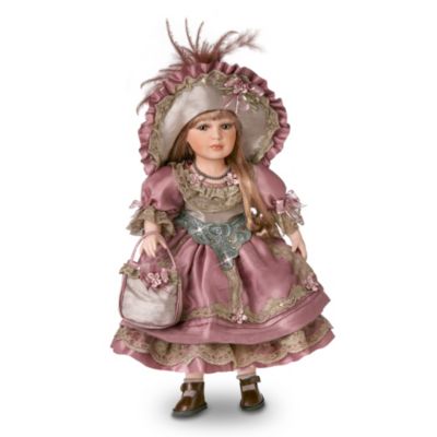 Jeanette is a French beauty of yesteryear who loves wearing the latest styles from European designers! Celebrating her passion for fashion, this collectible vintage style porcelain doll features a lovely hand-painted face, hand-set eyes and long, sweeping lashes.This gorgeous real porcelain girl doll is dressed for a special party, and available only from The Ashton-Drake Galleries. Jeanette wears a magnificent 8-piece costume that includes a party dress embellished with ruffles, lace, flowers and a sparkling design at the waistband. This porcelain doll in costume carries a matching handbag and wears a picture hat trimmed with pink feathers. Heavy demand is expected for this 18-inch collectible doll, and you won't want to miss out. Order now!