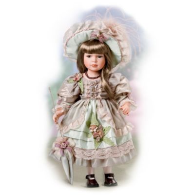 Unlike the flowers for whom she is named, Flora chooses to avoid the sun. She carries a parasol to provide a bit of fashionable shade, and to protect her beautiful porcelain complexion. Flora is a collectible porcelain doll who likes to promenade on the nicest days in her most exquisite finery. Today she wears a magnificent dress and matching hat all in pale green, lavishly trimmed with the loveliest ecru lace, pastel satin ribbon rosettes and fancy buttons. Her matching parasol* is so pretty when it's carried as a fashion accessory, it's hard to believe she will ever actually use it!Flora will delight you in a moment with her vintage-style details, available exclusively from The Ashton-Drake Galleries. This collectible porcelain doll really does have a fine, hand-painted porcelain complexion, as well as hand-set eyes, real eyelashes and long, silky blonde hair. Flora is simply breathtaking, and such a remarkable value that she is expected to generate high demand. This genuine collectible porcelain doll is an heirloom in the making, so be sure to order now!