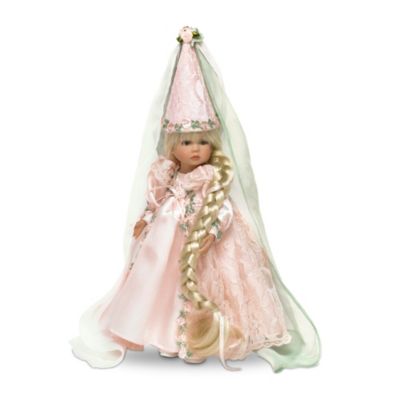Be whisked away to a world of imagination and happy endings with this lovely collectible fairytale princess doll by renowned Master Doll Artist Linda Rick. Doll's romantic pink gown and hat with lace overlays and floral trim - and her platinum blonde hair woven into an impossibly long braid - are delightful nods to the beloved Rapunzel!Envision a land of castles, princes and princesses with this dreamy collectible 8-inch vinyl doll, from The Doll Maker and Friends' Key to My Heart line. This fairytale princess doll's full body is lovingly crafted of collector-quality vinyl to show off her wistful expression, tender eyes and delicate hands and feet. But hurry! Exceptional demand is expected, and you won't want to miss out. Be sure to order now!