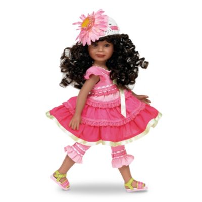 Playful Mitzi is sure to bring a little sunshine into your heart and add laughter to your days. This captivating collectible 12-inch tall vinyl doll from acclaimed Master Doll Artist Linda Rick is dressed for a day of fun, in a dress and petal pushers with ribbon, lace, rickrack and ruffle details. Matching striped sandals and a jaunty white straw hat with oversized daisy complete her sunny-side-up ensemble.Enjoy friendship and fun with this stunning 12" tall vinyl doll. Merry Mitzi is meticulously crafted of collector-quality vinyl, with a welcoming expression, bright eyes and delicate hands and feet. This playtime charmer is expected to generate unprecedented demand, and you won't want to miss out. Don't wait - order now!