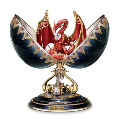 Enter the lair of the mighty dragon! Available exclusively from Ardleigh Elliott, this first-of-a-kind limited-edition red dragon collectible egg draws you inexorably toward a timeless quest! Handcrafted of fine Heirloom Porcelain&reg;, pewter and artist's resin, it rests upon an exotic base of dragonets and reveals a majestic dragon and treasure within!Observe closely the extraordinary level of detail: brilliant hand-painted hues of midnight blue and brilliant scarlet, opulent raised-relief designs, gleaming 22K gold and platinum accents, and over 60 hand-set simulated jewels! And clutched within its powerful protector's talons, a massive genuine Swarovski crystal, ablaze with magical light! Truly, a collectible red dragon gift of mighty import, for yourself or an honored friend! Do not delay - order now!California Residents click here for Proposition 65 notice.