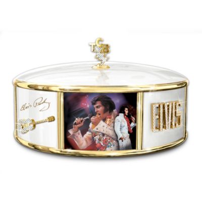When you just can't help falling in love with the King of Rock 'n' Roll&reg;, an exclusive Elvis Presley&reg; collectible music box is ready to charm you out of your blue suede shoes. This innovative Elvis&reg; collectible recaptures the sleek style of an Italian charm bracelet, with panels featuring artist Nate Giorgio Elvis art and classic icons associated with the King of Rock 'n' Roll.Offered exclusively by Ardleigh Elliott, this Elvis Presley collectible music box is handcrafted of Heirloom Porcelain&reg; and lavishly adorned with 22K gold and simulated jewels. A dazzling recreation of Elvis' famed TCB logo crowns this perfect Elvis fan gift idea, which plays the beloved melody "Can't Help Falling in Love." Strong demand is expected for this exclusive Elvis collectible. Order now!