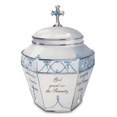 "God give me the serenity" It is a prayer that has touched the hearts of millions with its encouraging words of strength. Now a first-ever musical prayer box, surrounded by inspiring words from the Serenity Prayer, lets you place your deepest worries in God's hands, and is available only from Ardleigh Elliott.This premiere Heirloom Porcelain&reg; Christian music box comes with slips of colored parchment on which to write your prayers to place inside the prayer box. Lavishly adorned with intricate scrollwork, this beautiful Christian music box is crowned with a glorious jeweled cross and plays the reverent strains of "Amazing Grace." Shimmering with platinum accents and more than 100 Swarovski&reg; crystals and simulated jewels, this exclusive prayer box is an amazing collectible Christian gift. Order now! California Residents click here for Proposition 65 notice.