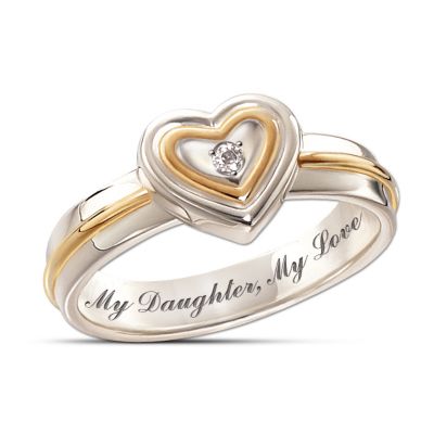 You've loved her from the moment you first learned she'd soon be arriving. A daughter holds a special place in our hearts, for strong is the bond and deep is the love, always and forever. Now, you can cherish that joyful relationship with a single brilliant-cut diamond nestled within a sterling silver diamond heart-shaped ring. Available only from The Bradford Exchange, this exclusive mother-daughter ring is a fine diamond jewelry creation that's as precious and enduring as your heartfelt affection. This sterling silver diamond heart-shaped ring sparkles with the radiance of a single genuine diamond, is accented with gleaming 24K-gold plating, and is inscribed inside with the words "My Daughter, My Love." Strong demand is expected for this lovely, one-of-a-kind gift for daughters! Order now!Suitable for ages 7 and over.
