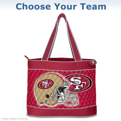 Carry your passion for your favorite NFL team wherever you go with this fashionable, take-anywhere NFL tote bag, available exclusively from The Bradford Exchange! Officially licensed by NFL Properties LLC, each NFL tote bag is adorned with team logos and striking artwork; it's the perfect way to show off the team you love. Choose your favorite team now, including the Green Bay Packers, New Orleans Saints, Chicago Bears, Indianapolis Colts and more!Each of these NFL quilted tote bags proudly displays your team's helmet, set against a dramatic team logo and the official NFL logo in a fashion-forward design. Handcrafted in a luxurious quilted fabric, these football tote bags are designed for lasting style, with two interior pockets and a zipper closure with a golden metallic team logo zipper pull. Plus, you'll also get 2 FREE coordinating, zippered cosmetic cases, perfect for game day and any day! Strong demand is expected so don't wait - order now!
