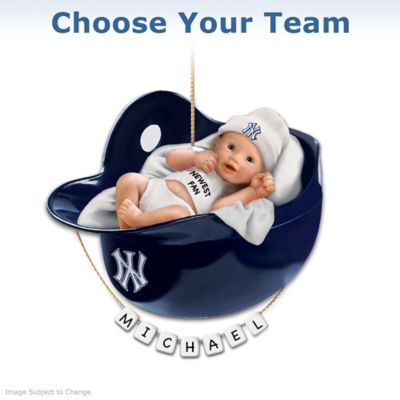 Was your little one born to be a baseball fan? For baby's first Christmas, there's no better way to celebrate than by showing everyone that he or she is ready to play ball! We are proud to introduce a first-of-its-kind commemorative baby's first Christmas ornament cheering on your favorite Major League Baseball&reg; team. Just choose your MLB&reg; ornament from a list of legendary baseball teams and, as an added bonus, you will also receive a FREE do-it-yourself personalization kit, so that a baby's name can be displayed as part of one completely adorable presentation.Officially licensed by Major League Baseball Properties, this collectible personalized MLB baby ornament is available from The Bradford Exchange, and features a tiny newborn dressed like a true baseball fan, and nestled in a baseball helmet. Masterfully handcrafted of artist's resin, with vivid hand-painting, your baby's first Christmas ornament sports team colors and logos too. This is your opportunity to make your child's first holiday season a home run. Don't wait - order now!