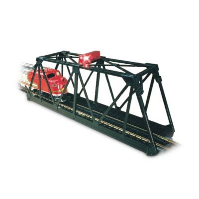 How would you like to shed a new light on your collectible N scale train layouts? Then make tracks to own this dynamic N scale bridge, bringing a whole new look of realism to your track layouts, with a glowing red light that "blinks" on and off (and requires no batteries). This heirloom-quality, classic-style N scale trestle bridge makes the perfect addition to your N scale train collection, and is available from The Bradford Exchange, Hawthorne Village Division.  Meticulously crafted by master artisans with precision detailing, this N scale bridge has the look of riveted steel girders to create bold realism. And it's easy to connect to existing E-Z Track&reg; N scale train accessories, as it snaps tight and requires no screws, nails or special tools for assembly. Strong demand is expected for all of our N scale train accessories, and you won't find a finer value anywhere, so order now!