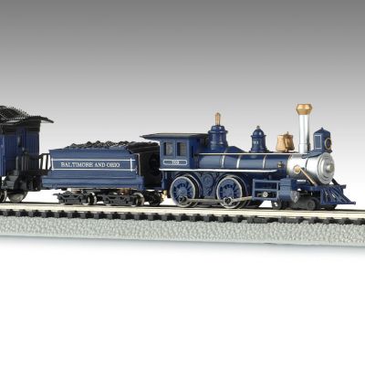 The Royal Blue was truly majestic, providing first-class service between New York City and Washington, DC at the turn of the 20th century. Now you can recall the luxurious transportation given to both the prominent and the powerful with The Royal Blue train set - an impressive N scale train set including everything you need to get started. This classic Bachmann train set can easily be displayed in even the smallest spaces, and it is available from The Bradford Exchange, Hawthorne Village Division.  Meticulously crafted by master artisans with precision detailing, the collectible Royal Blue train set includes an American 4-4-0 N scale steam locomotive and tender, classic combine and two classic coaches - each car sporting a distinctive cobalt blue, silver and gold paint scheme - along with 16 sections of E-Z Track&reg;, power pack and speed controller. Plus, The Royal Blue N scale train set includes an illustrated instruction manual to get things rolling. Strong demand is expected for all of our N scale trains and accessories, so don't wait. Order now!