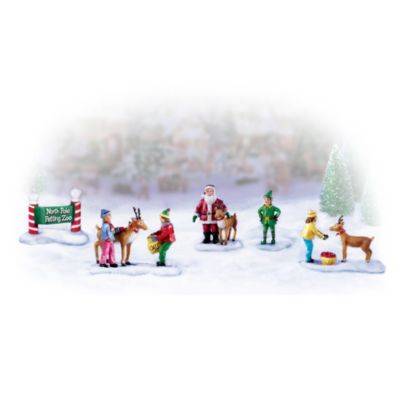 Add a special treat to your holiday season with a visit to your village's North Pole Petting Zoo! Just imagine how much fun these delightful Christmas village figurines will add to your beloved Christmas village display! From the welcoming sign, to Santa and his "Little Elfer," to Donner and Comet's ongoing quest for reindeer snacks, these five Christmas village accessories create the perfect fun-loving holiday atmosphere!Available exclusively from Hawthorne village, each of these miniature figurines is carefully handcrafted and hand-painted in wonderfully realistic detail! Now you can visit the North Pole Petting Zoo anytime you like! A terrific value you don't want to miss - order now!