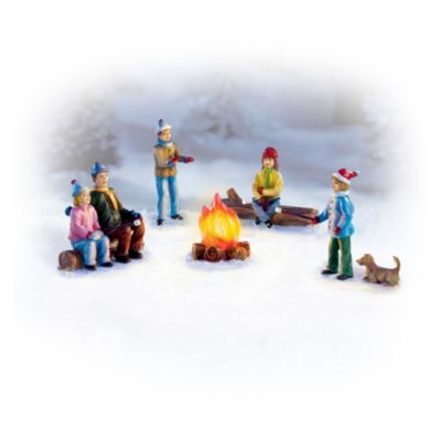 When the cold really sets in, it's fun to sit by a crackling fire and indulge in some delicious toasted marshmallows. Ooey-gooey and oh-so-tasty they're the perfect reason to get together and create warm memories. Now, you can create a town setting that is brimming with the beauty of the season with this five-piece set of handcrafted, hand-painted winter village accessory figurines.Warm your hands (and heart!) with these winter town accessory figurines, available only from Hawthorne Village. With the flick of a switch, the "Campfire" figurine lights up with a welcoming glow. And you won't find a finer value anywhere! Strong demand is expected, and you won't want to miss out. Order now!