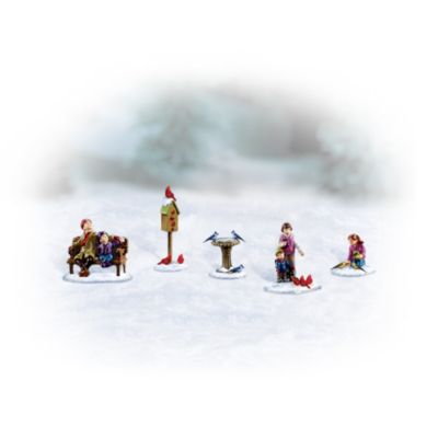 Nothing is more relaxing on a cold winter's day than watching winter birds cavort in the snow, with their cheerful chirps and friendly flutters,. Now, charming collectible winter village accessories bring their vibrant color and life to your treasured village figurine accessory set. Available exclusively from Hawthorne Village, these wonderfully lifelike collectibles are handcrafted and hand-painted to capture each intricate detail. There's so much to enjoy, from the brilliant red of the cardinals at a feeder to the blue jays at a birdbath and human friends taking time to share seeds and breadcrumbs. A bird-lover's dream, this is an appealing addition to your collectible village display. You won't find a better value anywhere, so don't wait. Order now!