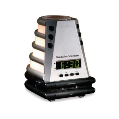 Now, you'll feel better when waking up in the morning with this peaceful alarm clock. It uses gradual light cycles, stimulating aromatherapy and nature sounds to naturally bring you out of sleep. At 30 minutes before the set alarm time, the clock's light glows softly and brightens over the next half hour. At the same time, the warmth from the lamp releases faint aromatherapy scents into the air to stimulate the olfactory senses.Even better, this nature sounds clock generates your choice of six soft sounds fifteen minutes before the alarm time. You can choose from ocean surf, songbirds and four others. At the end of the cycle, a beeper sounds to ensure you wake up on time. Your clock also includes four packets of aroma beads, 10 felt disks for aromatherapy oils, a snooze button, headphone jack and volume control. Don't wait to try this peaceful alarm clock tonight. Order now!
