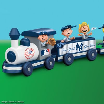 When a legendary baseball team meets a classis comic strip, you know you're in for the ride of your life! Now you can introduce the children in your life to the world of Charles Schulz and the New York Yankees with this fun-tastic Peanuts toy, available from The Bradford Exchange Heirloom Toys. Charlie Brown, Snoopy, and more favorite pals are dressed as Yankees and are ready to catch, pitch and swing into action with this officially licensed wooden train collection. This dynamic interactive toy offers limitless possibilities for role-playing and "pretend" for active, growing minds. It can also help expand coordination and motor skills - an invaluable component of your child's development. Your children will be on track to "get in the game" from the moment you receive Issue One, the Starter Set in your collection, featuring the Locomotive with removable Charlie Brown figure, and the New York Yankees Pennant Car with removable Linus and Sally figure. Future issues will feature wooden train cars and detailed removable Peanuts character figurines, as they become available. Plus, as part of your heirloom-quality Peanuts toy collection, *you will also receive a felt baseball diamond mat and wooden home run fence to expand the fun. Give your little Peanuts and Yankees fans a "ride" they can experience for years to come. Order now!