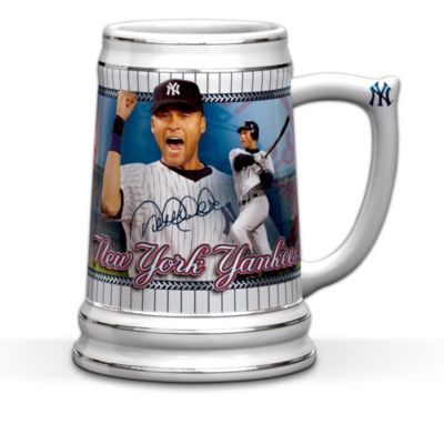 Celebrate the winning tradition of the New York Yankees&reg; with this exciting, first-ever New York Yankees stein collection, available from The Hamilton Collection! This incredible collection features the most popular New York Yankees players, starting with Issue One, the Derek Jeter Stein. Before you know it you'll be able to toast your favorite team in style as your collection continues with Issue Two and additional issues of New York Yankees steins, each a separate issue to follow.Each of the collectible New York Yankees steins in this collection is finely crafted of porcelain, and enhanced with official New York Yankees logos, colorful graphics and platinum accents. Plus each stein showcases dynamic images of one of the Yankees&reg; stars, including Alex Rodriguez, Johnny Damon, Jorge Posada, Mariano Rivera, Robinson Cano and more. Each player's stein even features his replica signature! These incredible New York Yankees collectibles are officially licensed by Major League Baseball Properties and the Major League Baseball Players Association, and they make outstanding Yankees gifts, so don't wait! Strong demand is expected for these fine limited editions, and you don't want to strike out - order now!