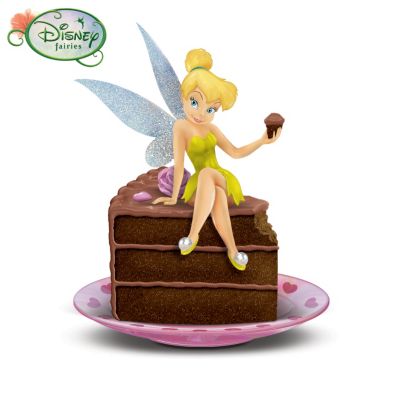Join the sauciest sprite around as she indulges in her favorite chocolate treats with this Disney Tinker Bell figurine collection from The Hamilton Collection! Created in conjunction with Disney artists, your decadent collection begins with Issue One, Never Met a Chocolate I Didn't Like. Soon, your "just desserts" will continue with Issue Two, Nobody Knows the Truffles I've Seen  and additional Disney Tinker Bell figurines, each a separate issue to follow.Each figurine in the collection showcases Tinker Bell enjoying a chocolate dessert, such as a wedge of luscious devil's food cake! These sweet Tinker Bell collectibles are each handcrafted and hand-painted in full color with pearlescent, porcelain-like glaze accents. Plus, each figurine features Tink wearing her signature green costume and a pair of magical fairy wings that shimmer with "pixie dust" glitter. Don't miss this delicious limited-edition tribute to the finer things in life - Tinker Bell and chocolate! Strong demand is expected, so order now!Fine collectibles, not intended for children.